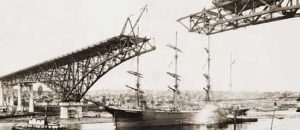 A historic photo of the Aurora Bridge just as it's opposite ends are to be connected.