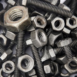 An assortment of nuts and bolts in a box