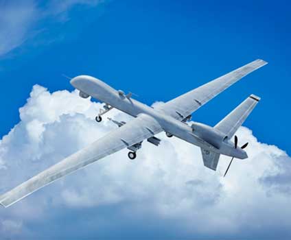 A unmanned aerial system (UAS) carries out its mission in the air.