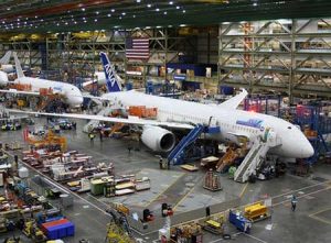 Boeing Dreamliners roll through the assembly plant in Everett, Washington