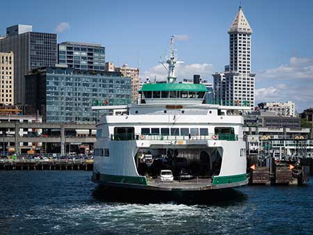 A Washington State ferry prepares to dock in downtown Seattle.