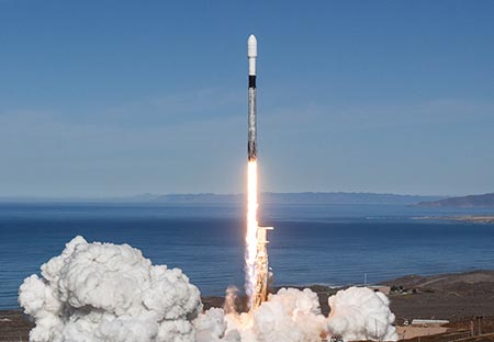 A SpaceX rocket propels 64 Spaceflight Industries satellites into orbit.