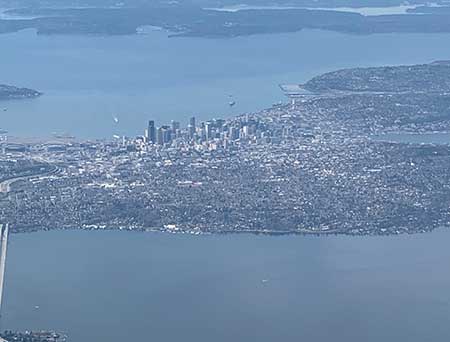 The Seattle skyline with Puget Sound in the background.