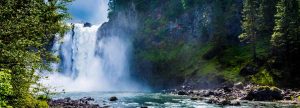 Water pours over Snoqualmie Falls, part of Washington State's power grid