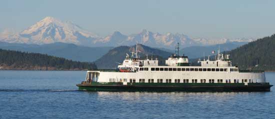 A Washington State ferry passes the Olympic Mountains