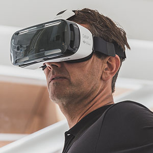A man tests a virtual reality headset