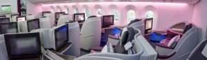 The interior cabin of business class on a 787 Dreamliner.