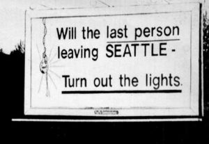 Billboard that says Will the last person leaving Seattle - please turn out the lights