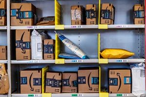 A bunch of Amazon boxes await delivery in a warehouse.